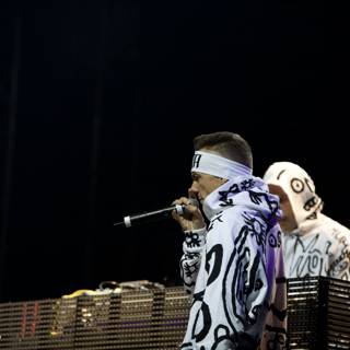Hoodie-performer on Coachella stage