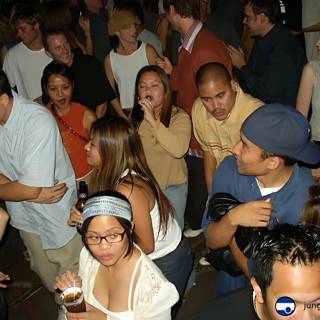 Party-goers in a Baseball Cap