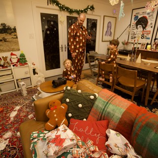 Family Christmas Morning in Festive Living Room