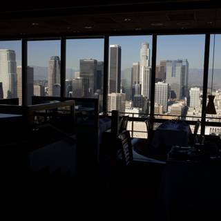 Panoramic View of the Urban Skyline from Inside the Restaurant