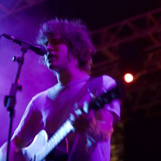 Andrew VanWyngarden Rocks the Stage with His Guitar