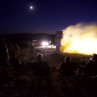 Watching the Flames of a Rocket Launch