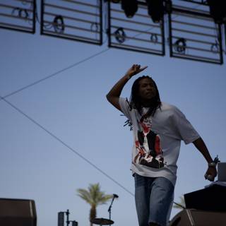 Dreadlocked Man Performs at Coachella Music Festival