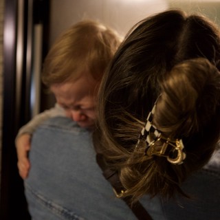 Intimate Embrace: Three Women Sharing a Warm Hug
