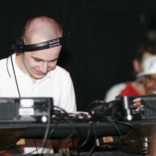 DJ Craze Entertains with Headphones on