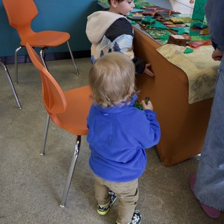 Children Engaged in Interactive Play at Learning Center