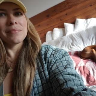 Yellow Hat and Comfy Bed: A Woman and Her Furry Companion