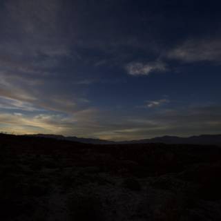 Desert Sunset over the Mountains