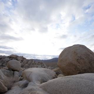 Solitary Rock in Desert Landscape