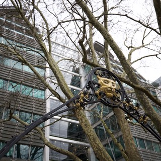Ornate Victorian Lamppost Against Modern London Architecture