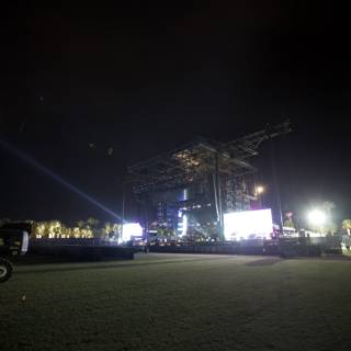 Concert Stage with Light Show and Truck in the Background