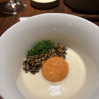 Minimalist Fine Dining Course with Mushrooms and Egg Yolk