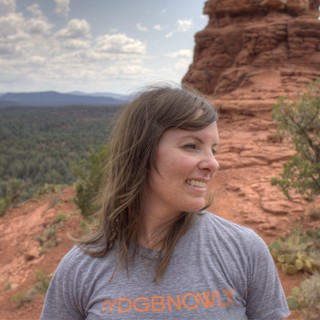 Smiling Hiker Atop Sedona Red Rock Vista