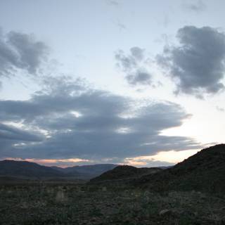Cloudy Sunset over Hilltop Plateau