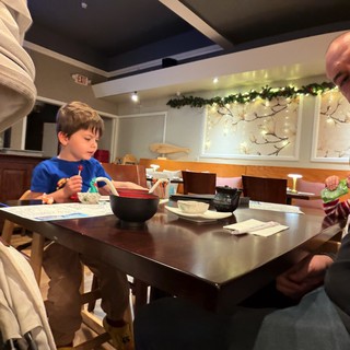 Family Dinner Time at Asian Restaurant