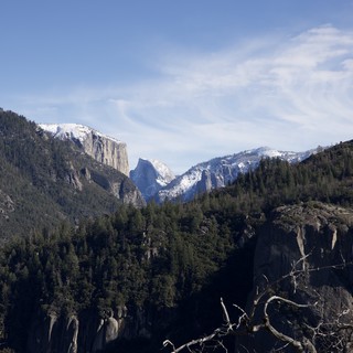 Half Dome Framed by Snowy Granite Cliffs