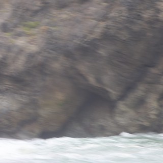 Rugged Coastal Cliffs Battered by Churning Ocean Waves