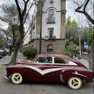 Maroon Coupe Parked in Urban Mexico
