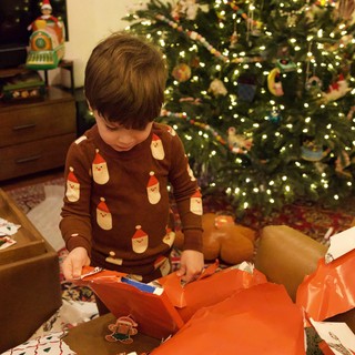 Christmas Morning Gift Opening with Decorated Tree