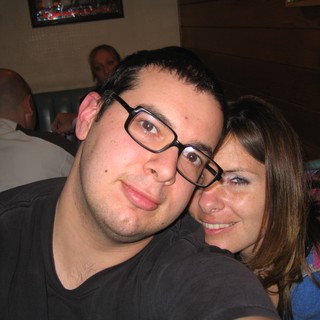 Friends Posing Close Together at a Casual Bar