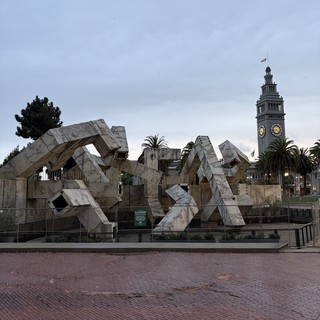 Vaillancourt Fountain and Ferry Building Clock Tower on Overcast Day