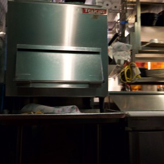 Commercial Kitchen Dishwashing Station in Operation