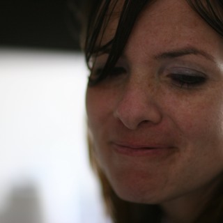 Thoughtful Woman in Soft Candid Portrait Light