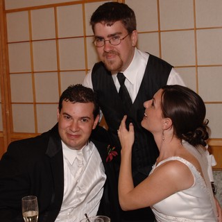 Wedding Reception Trio Sharing a Joyful Moment