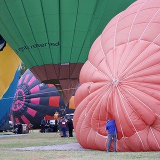 Ground Crew Inflates Colorful Balloons at Sonoma Classic