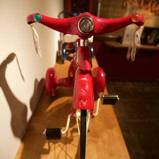 Toy Bike on a Wooden Table