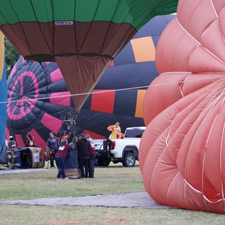 Ground Crew Inflates Balloons at Hot Air Festival