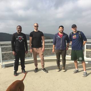 Four Men and a Dog Enjoying the View