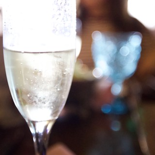 Sparkling Champagne Flute with Bokeh Light Effects