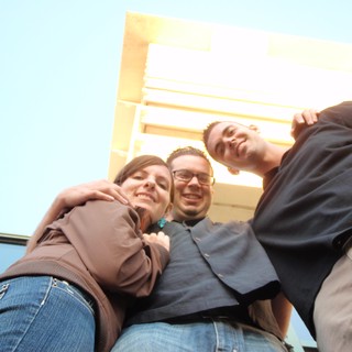 Three Friends Posing from a Worm's Eye View