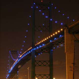 Suspension bridge illuminated at night