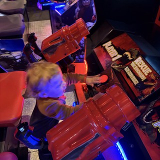Young Gamer Playing Retro Arcade Cabinet at Home