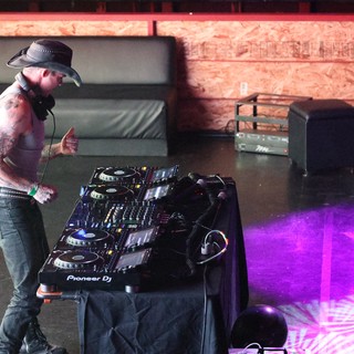 Tattooed DJ Rocks Pioneer Decks at Wobbleland Festival