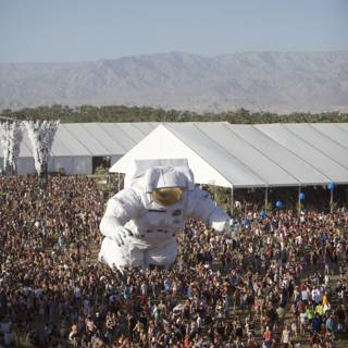 Festive Crowd Under a Giant Balloon