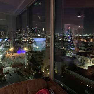 Urban Night Skyline from Living Room Window