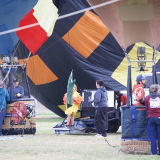 Ground Crew Prepares Hot Air Balloons for Launch