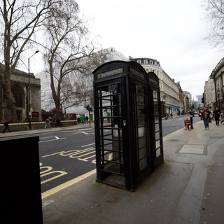 Black Telephone Box on London Street Corner