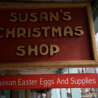Susan's Christmas Shop Sign with Ukrainian Easter Eggs