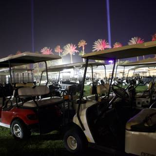 Nighttime Retreat: Golf Carts in the Field