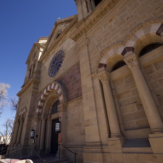 Historic Romanesque Cathedral Facade with Bell Tower
