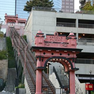 Pink Urban Building with Staircase and Handrail
