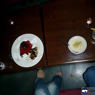 Feet up, food on the table