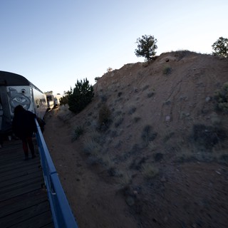Twilight Train Journey Through Desert Hills