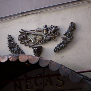 Emblematic Metal Sculpture on Building