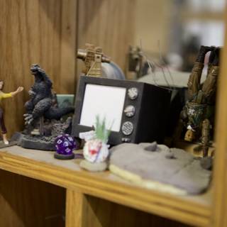 Wooden Shelf with Figurines and Toys