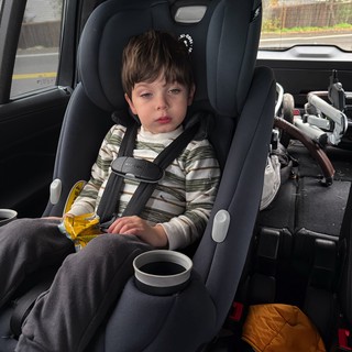 Young Child in Car Seat During Winter Journey